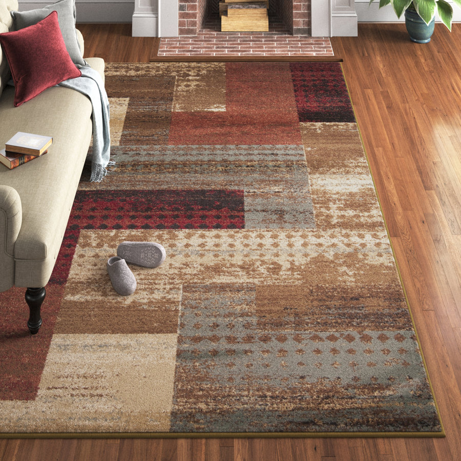 Fegan Geometric Brown Area Rug